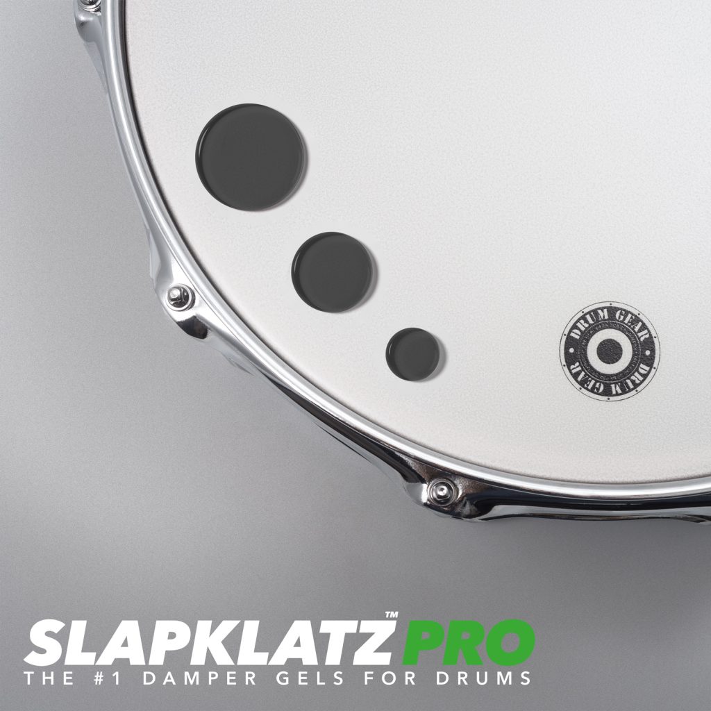 SlapKlatz PRO black - all 3 sizes - shown on a drum head.